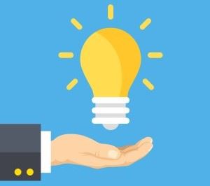 Illustrasjon av en lyspære i en hånd